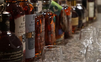 bottles of whiskey and glasses